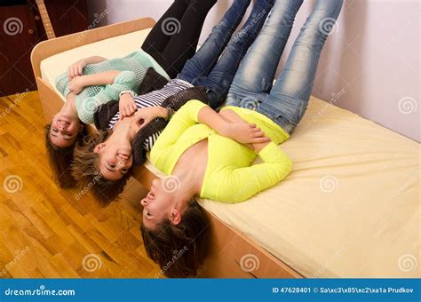 Three Teenage Girls Having Fun On The Bed Stock Image Image Of