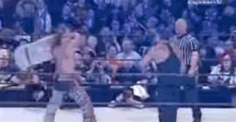 No, its the guy writhing in pain on the floor in the background thats about to get a chair over his head. 10 Sickest WWE Steel Chair Shots Ever - Page 7