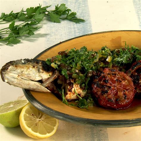 Grilled Sea Bass With Herb And Raisin Salsa And Chermoula Marinade Ottolenghi Recipes Seafood