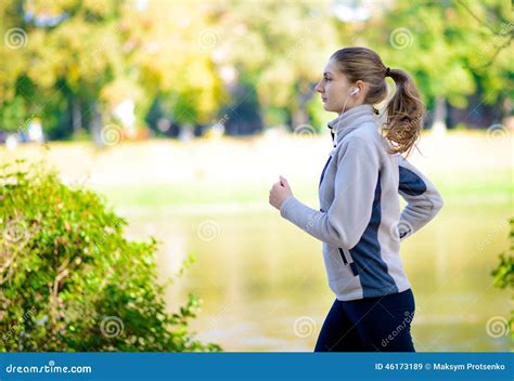 Young Beautiful Woman Running In The Autumn Park Stock Image Image Of