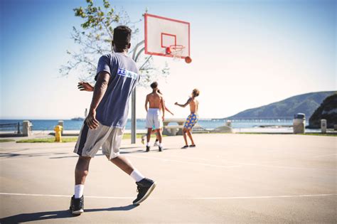 Four People Playing Basketball · Free Stock Photo