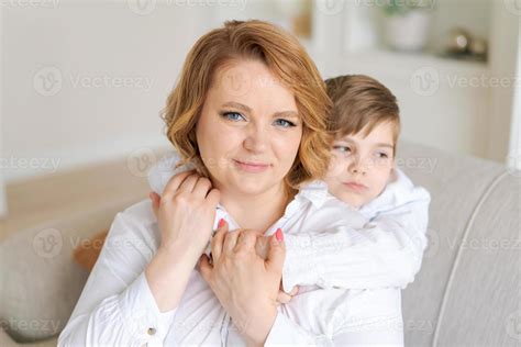 Happy Woman Have Fun With Cute Baby Boy 5 6 7 Years Old In White Shirt