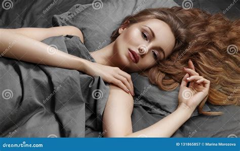 Beautiful Woman Sleeping While Lying In Bed With Comfort Sweet Dreams