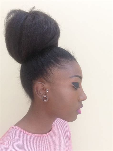 An Easy To Style Natural Hair Bun Using Braiding Hair For Black Women