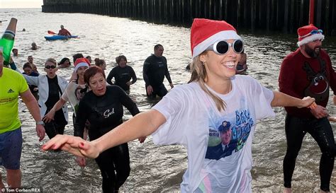 Boxing Day Swimmers Strip Off Into Skimpy Outfits For Another Festive