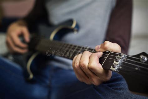 Closeup Of Teenage Boy Playing Guitar Stock Image Image Of