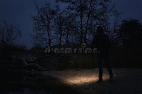 Man With Flashlight Walking Near River Stock Image Image Of Hike