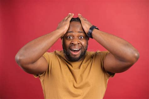 Shocked African American Guy On Red Stock Photo Image Of Face Mouth