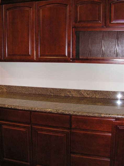 Just wondering when you sanded, did you remove the top layer (gloss) and the previous stain color to bare the natural oak. Oak Kitchen Cabinets | Contemporary Kitchen Cabinets ...