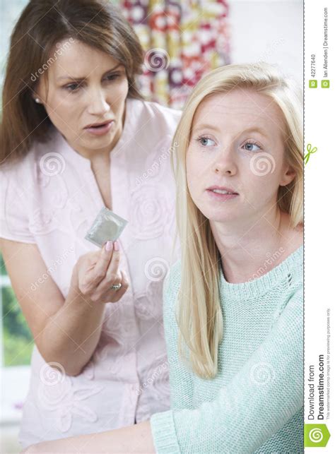 Mother Talking To Teenage Daughter About Contraception