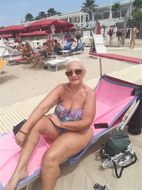 See And Save As Busty Italian Granny Mature Milf On The Beach Very Hot