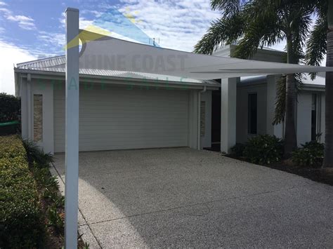 A driveway canopy is designed to protect a car sitting outside of a garage. Carports and Driveways - Sunshine Coast Shade Sails