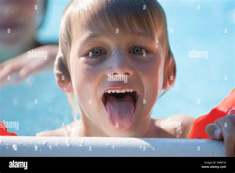 Boy In Swimming Pool Sticking Hi Res Stock Photography And Images Alamy