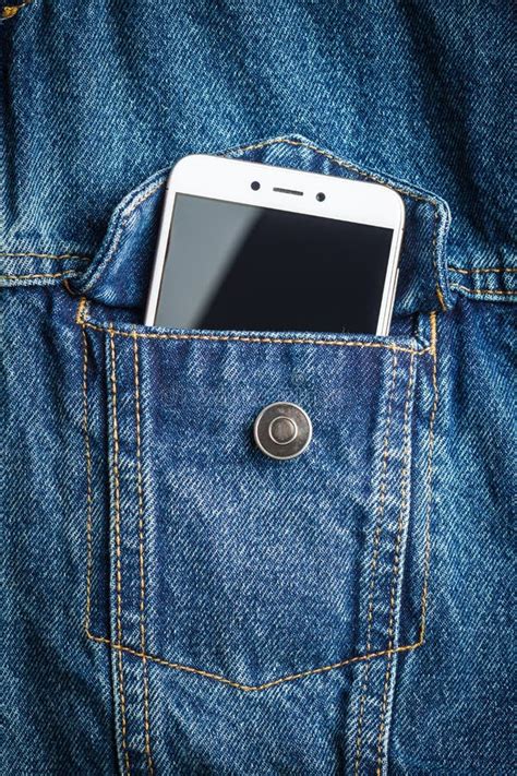 Smartphone In Jeans Jacket Pocket Stock Photo Image Of Device Blue