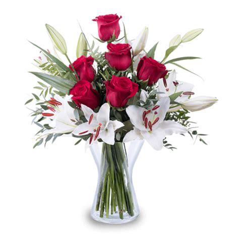 Per il novantesimo compleanno che fiore si regala? Mazzo di Fiori Invernali: Rose Rosse e Gigli - FloraQueen