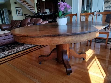 Formal high end antique reproduction pedestal table. ANTIQUE OAK ROUND/OVAL PEDESTAL DINING TABLE with 2 Leaves ...