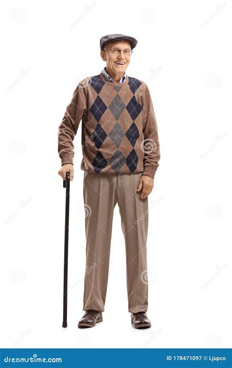 Senior Man Standing With A Walking Cane And Smiling At The Camera Stock