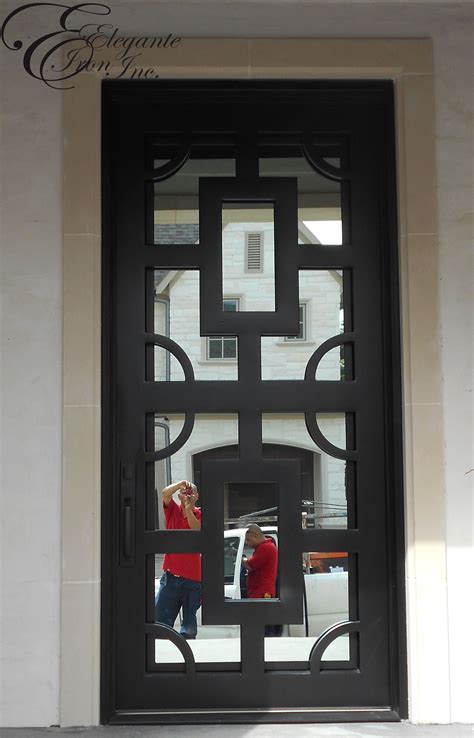 The corrosion resistance and other useful properties of. Contemporary iron door. | Metal doors design, Iron doors ...