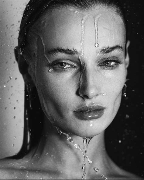A Woman With Water Dripping From Her Face