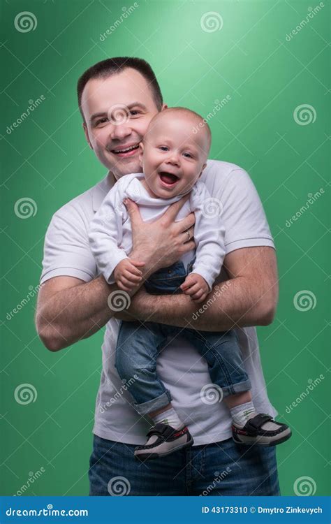 Happy Smiling Father Embracing His Baby Boy Stock Photo Image Of