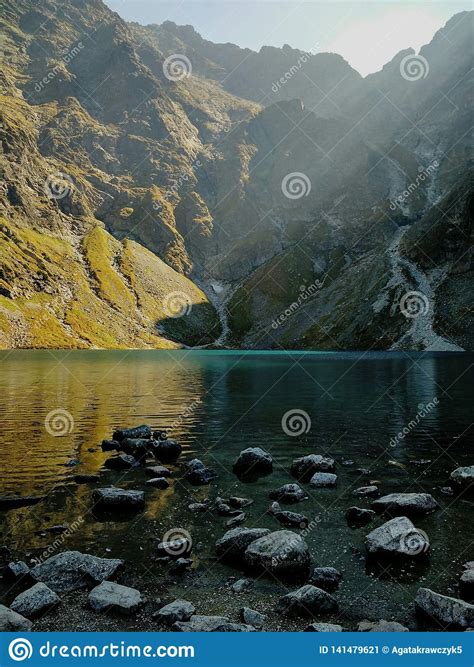 Turquoise Lake In Mountans With Sun Rays Stock Image Image Of