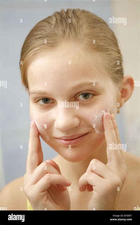 Preteen Girl Creaming Face Stock Photo Alamy