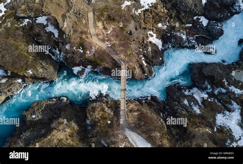 Aerial View Bridge And Raging River Hvítá From Above Near The