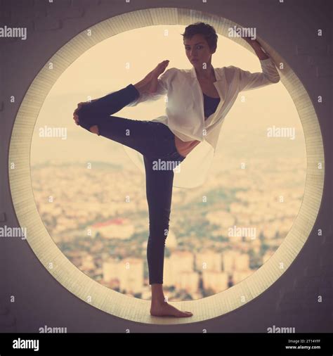 Beautiful Fit Yogi Woman Practices Yoga Asana Natarajasana Lord Of The Dance Pose In A Round