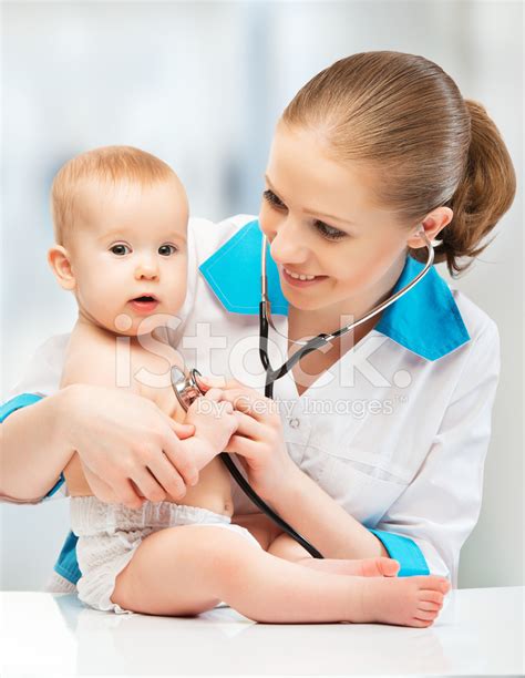Baby And Doctor Pediatrician Stock Photo Royalty Free Freeimages