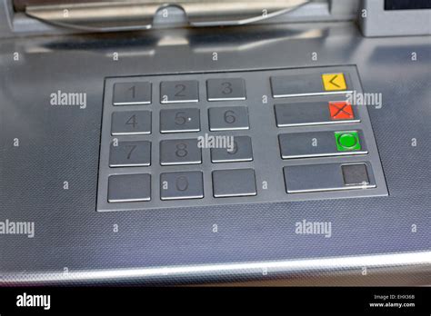 Detail Of An Atm Machine Metallic Keyboard And Insert Card Stock Photo