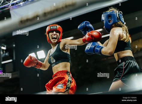 Two Female Muay Thai Fighters During A Competition In Bangkok Thailand