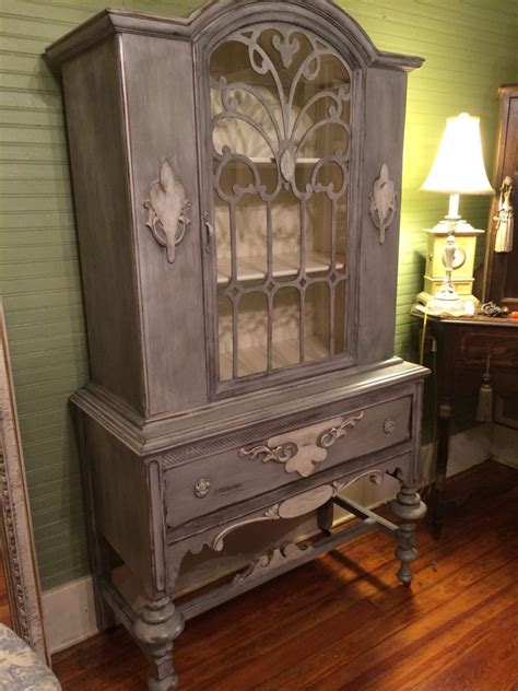 Annie sloan chalk paint is one of the easiest ways to transform an older, outdated piece of furniture. Antique Cabinet painted with Annie Sloan's Paris Grey and ...