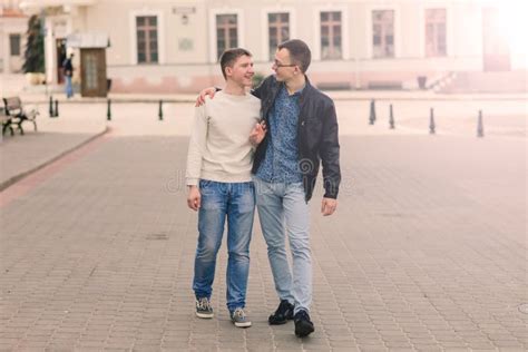 Cute Gay Couple In The City Tender Gentle Kissing Smiling Stock Photo