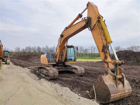 Excavator Parked At The Construction Area Stock Photo Image Of Earth