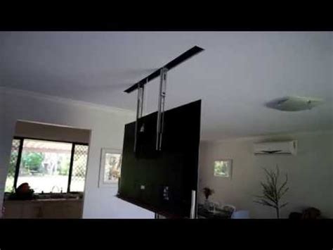Simply add the tv mounting brackets. Viral Video UK: Hidden TV in ceiling - YouTube