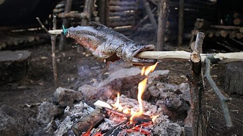 Catch N Cook Spit Roast Tiger Trout At The Bushcraft Camp Youtube