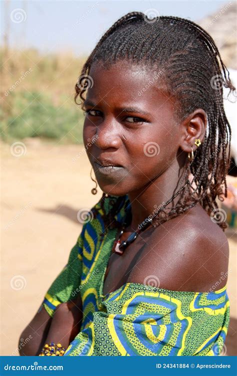 african girl with raised arm editorial photo 4410547