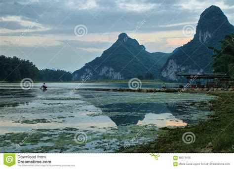 Karst Mountains Reflected In Li River At Sunset Stock Photo Image Of