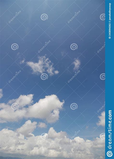Stratocumulus Clouds With A Clear Blue Sky Background In The Midday