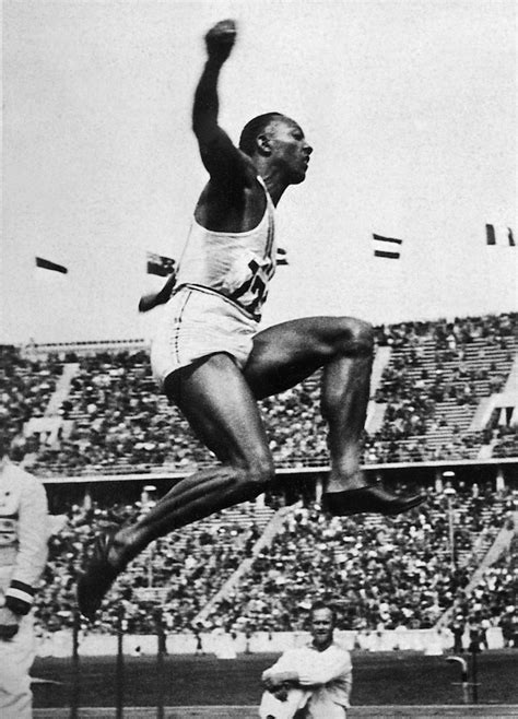 9 Photos Of Jesse Owens At The 1936 Olympics Show What An American Hero Looks Like
