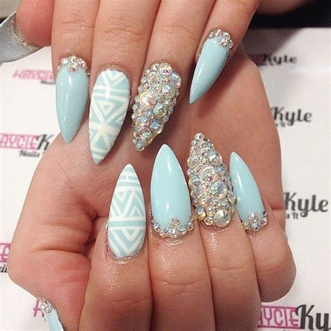 Stiletto Baby Blue Nails With Designs On Each Nail Blue Stiletto