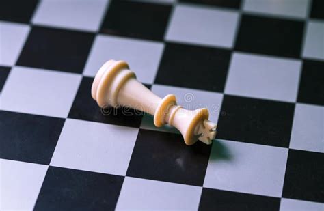 White King On Chess Board White Player Lose On Checkered Board Stock
