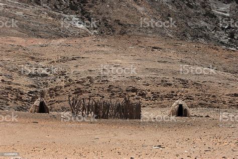African Huts In Middle Of Desert Himba Tribe Namibia Stock Photo