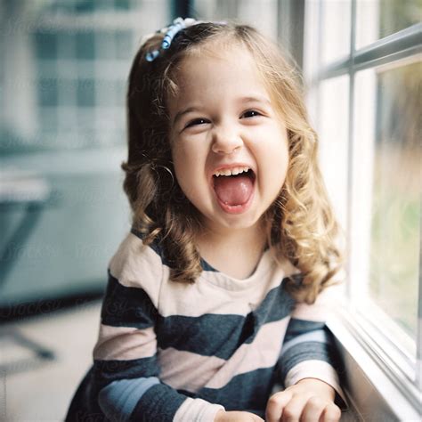 Adorable Young Girl With A Cute Expression On Her Face By Stocksy Contributor Jakob