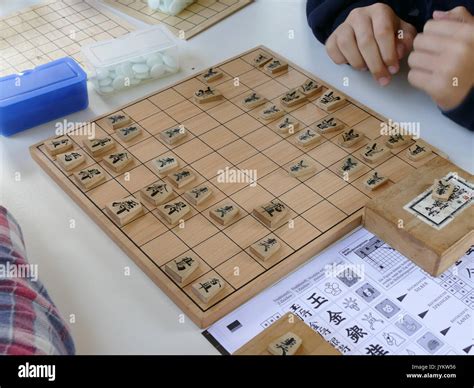 Player learning playing Japanese Chess board game Stock Photo - Alamy