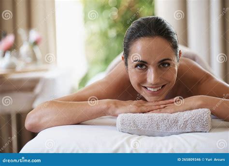 You Should Get A Massage Portrait Of An Attractive Woman Resting On A Massage Table Stock
