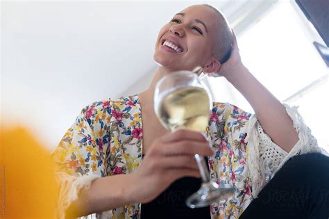 woman enjoying glass of wine by stocksy contributor jamie grill atlas stocksy