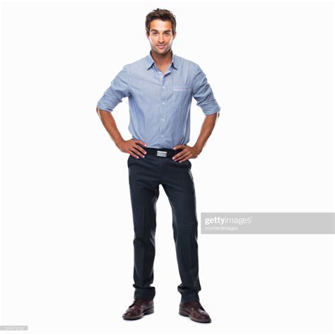 Portrait Of Young Business Man Standing With Hands On Hips And Man