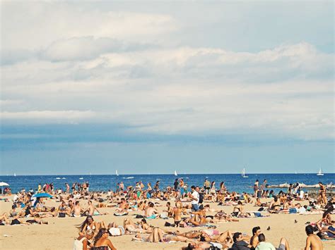 Beach in Barcelona, Spain under the clouds image - Free stock photo
