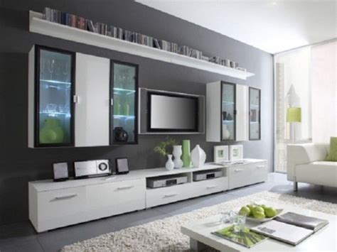 Decide where you want to mount your tv. Wall Mounted Flat Screen TV On Gray Wall Color Surrounded ...
